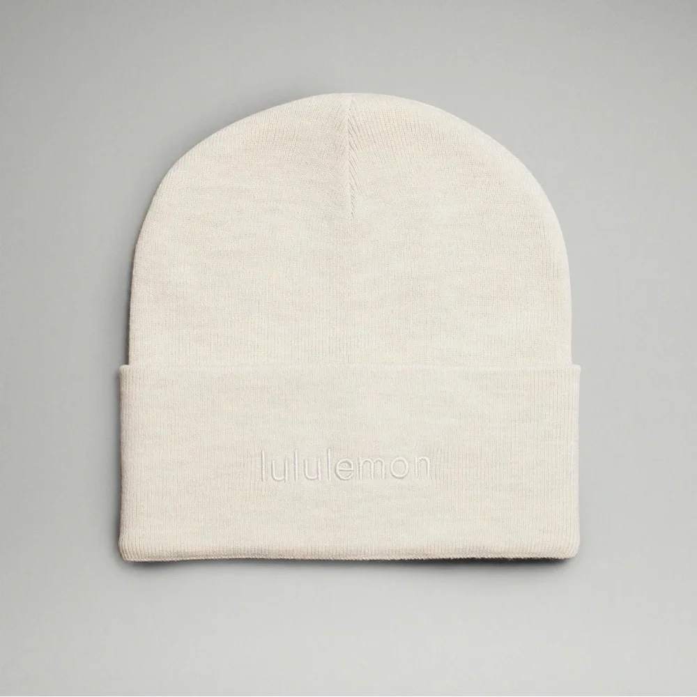 Lululemon Warm Revelation Beanie Winter Hat Wordmark Logo Heathered Bone NWT